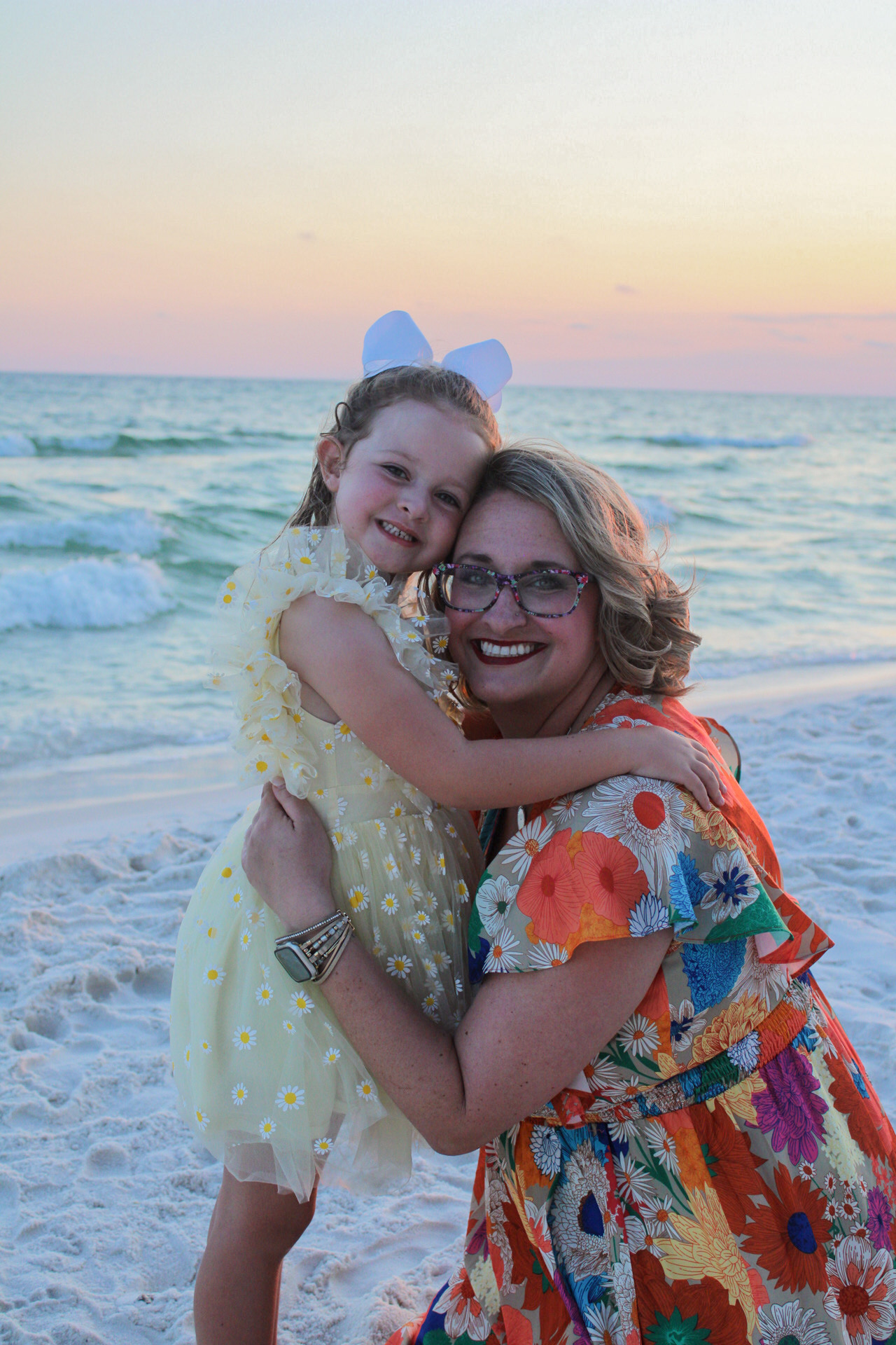 Couple embracing during a relaxed Gulf Coast beach session